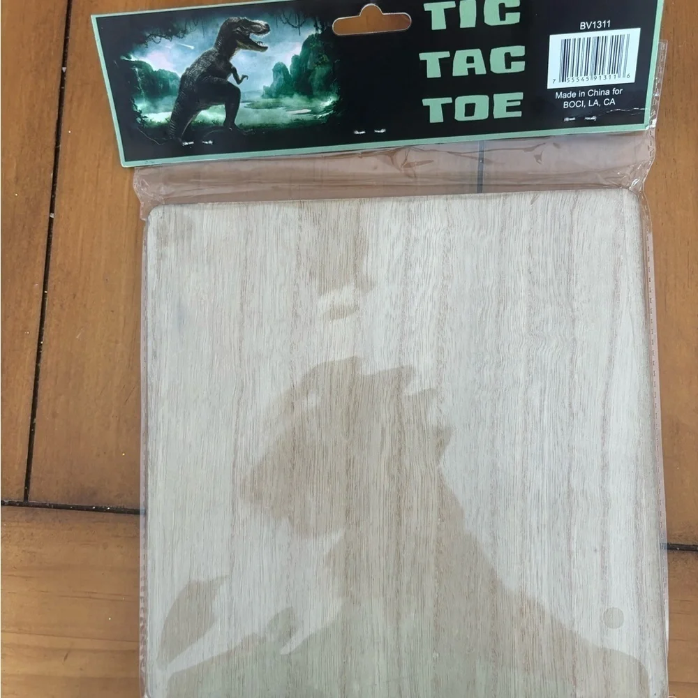 Dinosaur tick tack toe game. Brand new